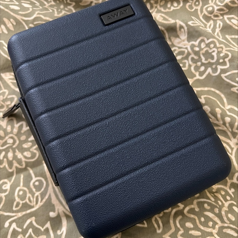 Empty United Airlines AWAY amenity kit